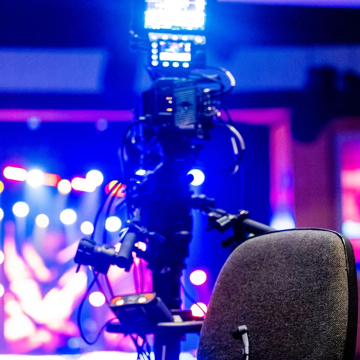 A broadcast camera live-streaming a church service